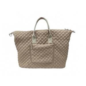 NEW TRVL DESIGN women's overpacker duffel bag in wheat